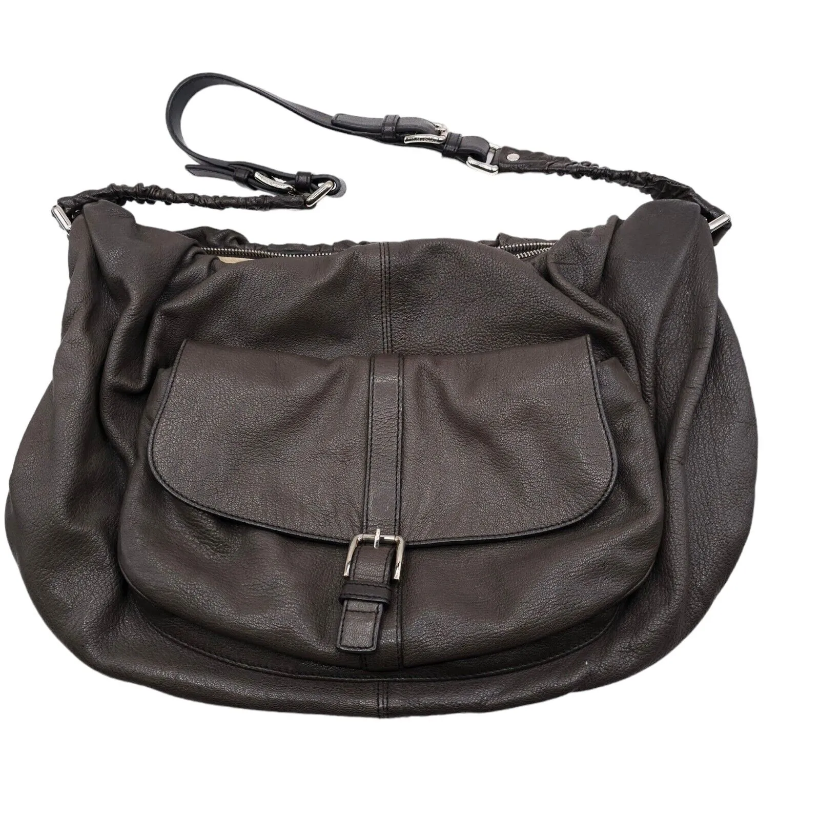 Angled front view with bag zipped and handles upright.